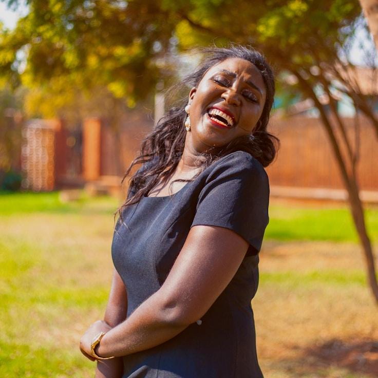 Alex Rivera, Lead Design Curator at MarbleHarborLeaf, reviewing corporate floral arrangements